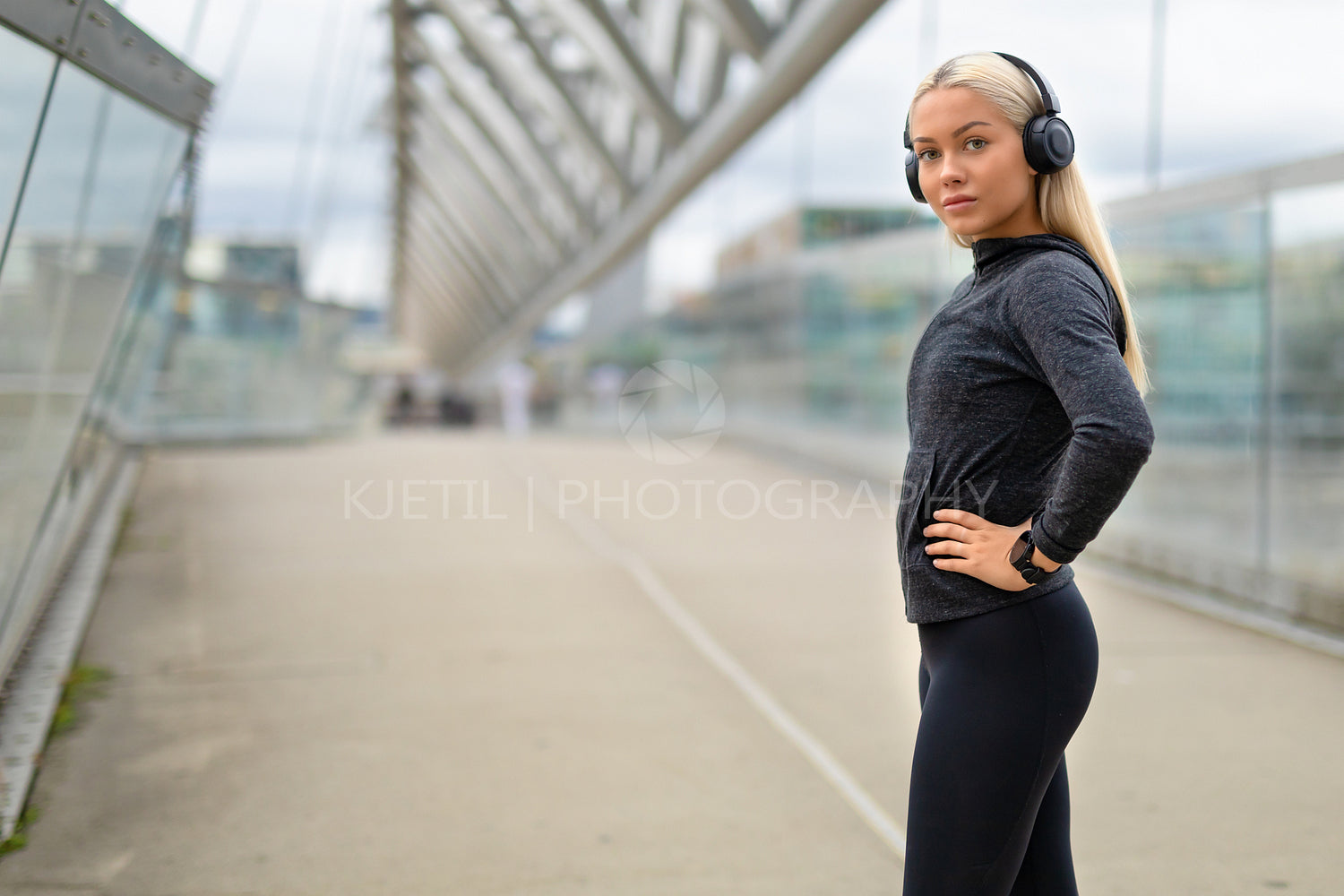 Smiling Woman in Black Workout Outfit Listen To Music on Headphones