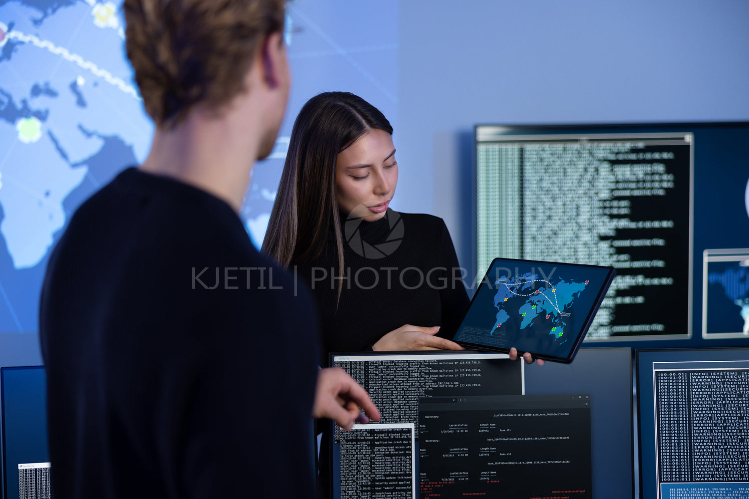 Cyber security team working in a Cyber Security Operations Center SOC to protect systems and technologies