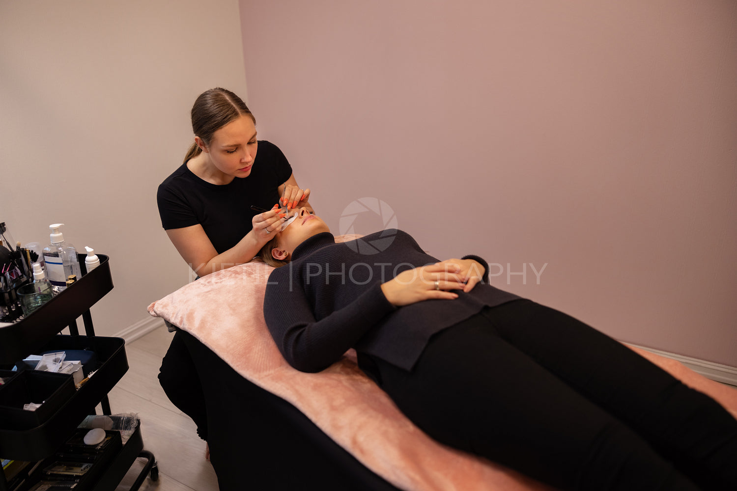 Beautician Treating Female Customer For Eyelash Extension