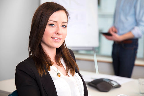 Confident Businesswoman Smiling In Office