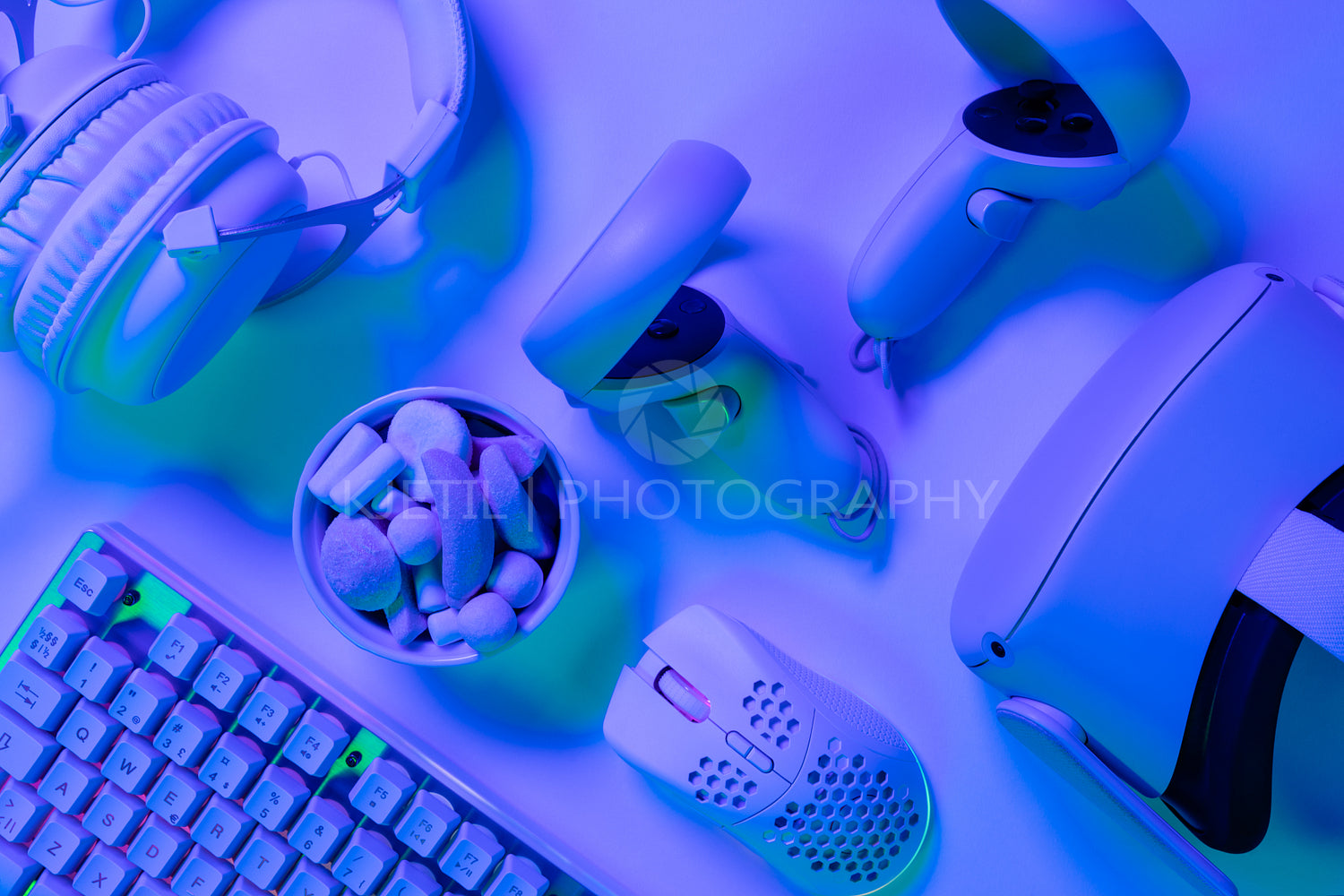 Keyboard with marshmallows and accessories on desk