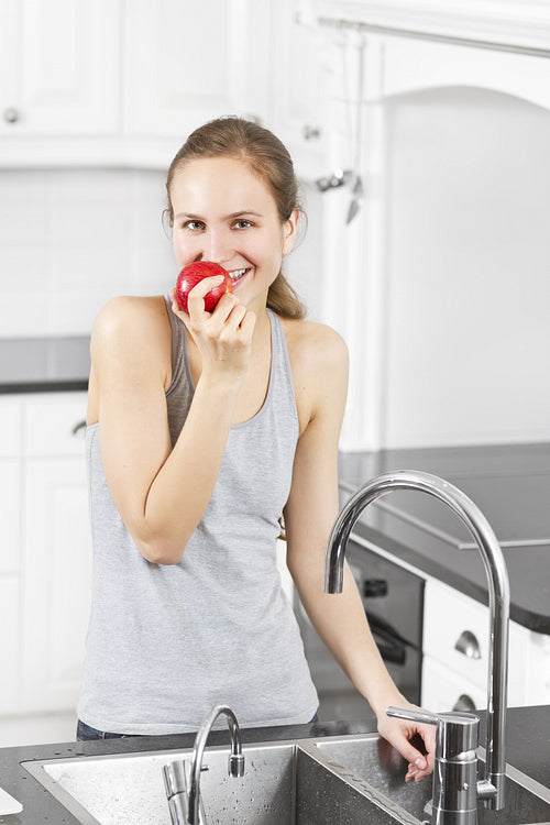 Natural and Healthy Woman eat an Apple