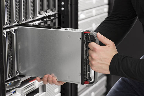 IT Engineer insert a Blade Server in Data Center