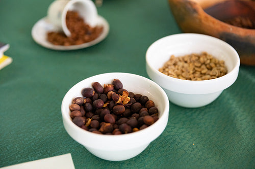 Bowls of beans showing the process of coffee production