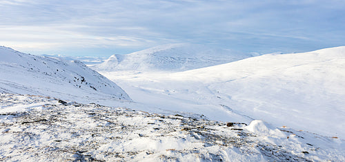 Scenic view of the snow covered landscape of the Dovre mountains in Norway at winter