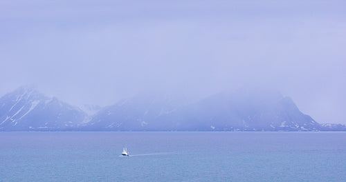 Tourist boat in the arctic environment near Svalbard
