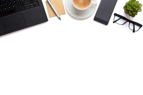 Laptop With Coffee Cup, Eyeglasses And Smartphone On Isolated White