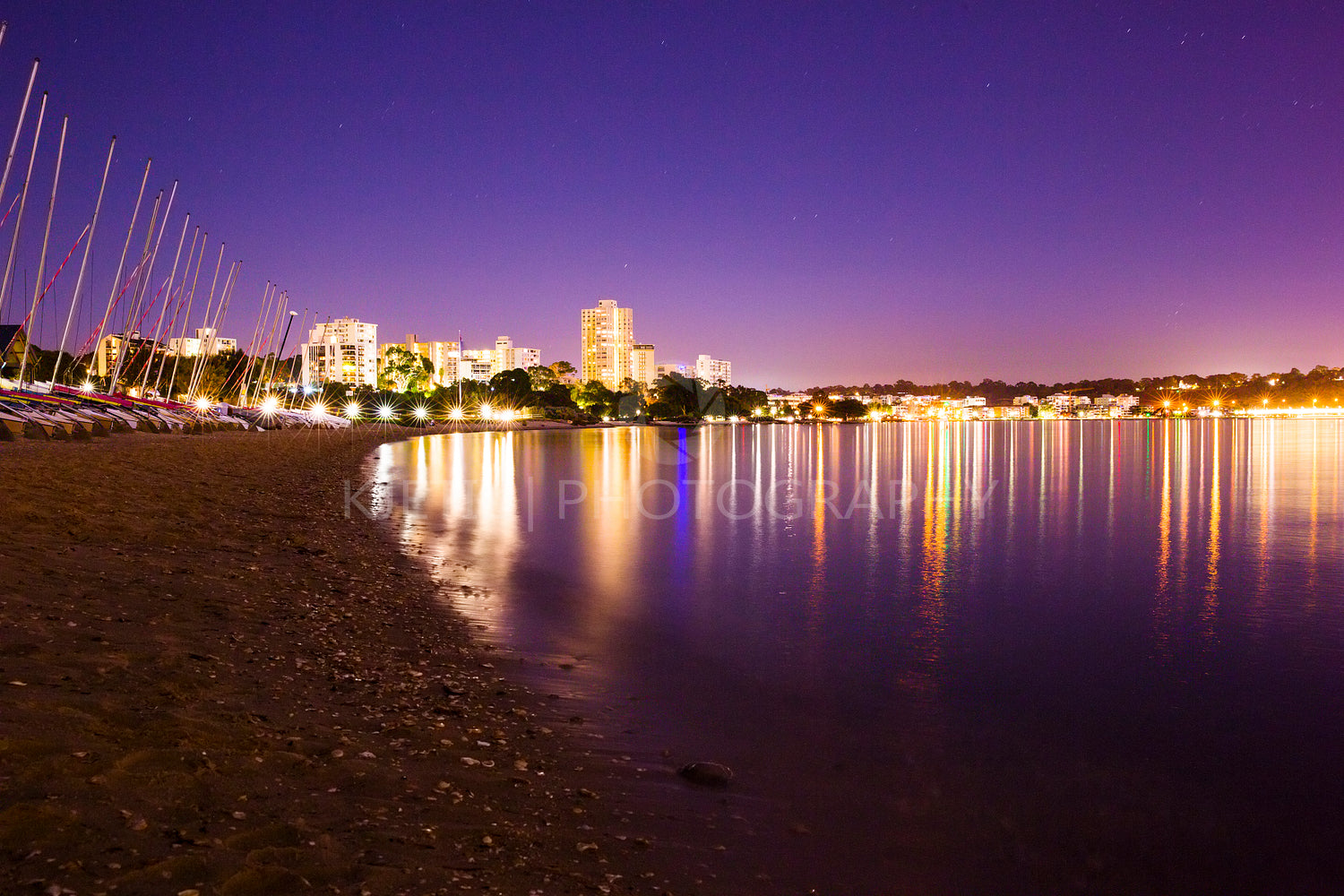 Perth city beach and boats at night