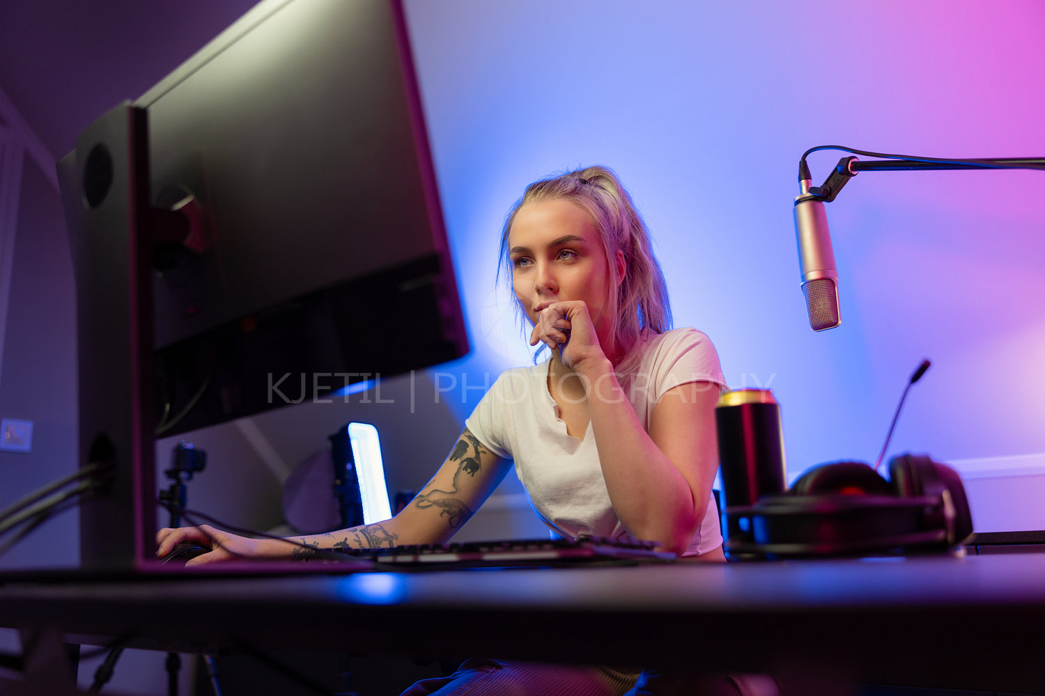 Cool looking professional gamer girl streams and play online mul