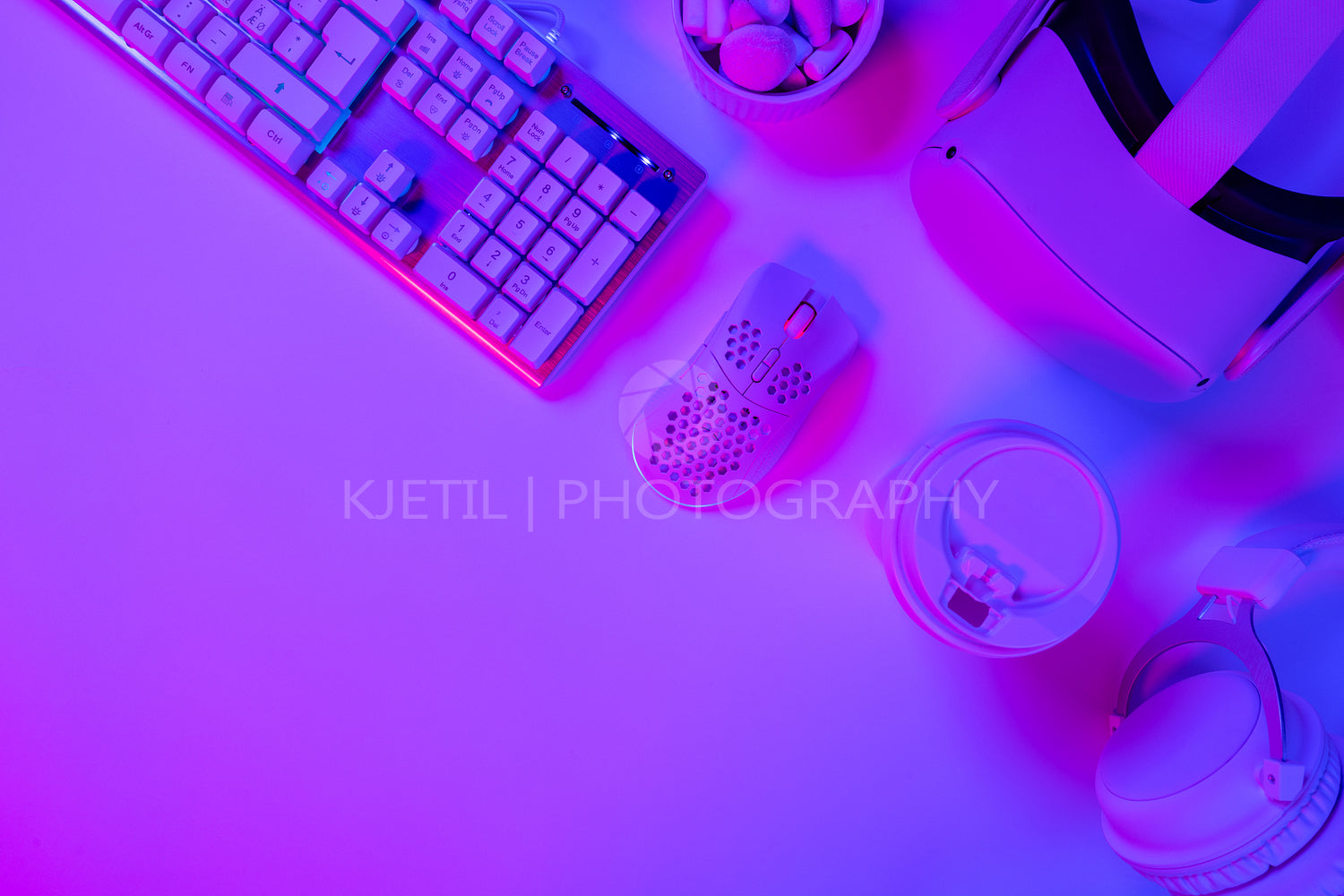 Keyboard with mouse and disposable cup on desk