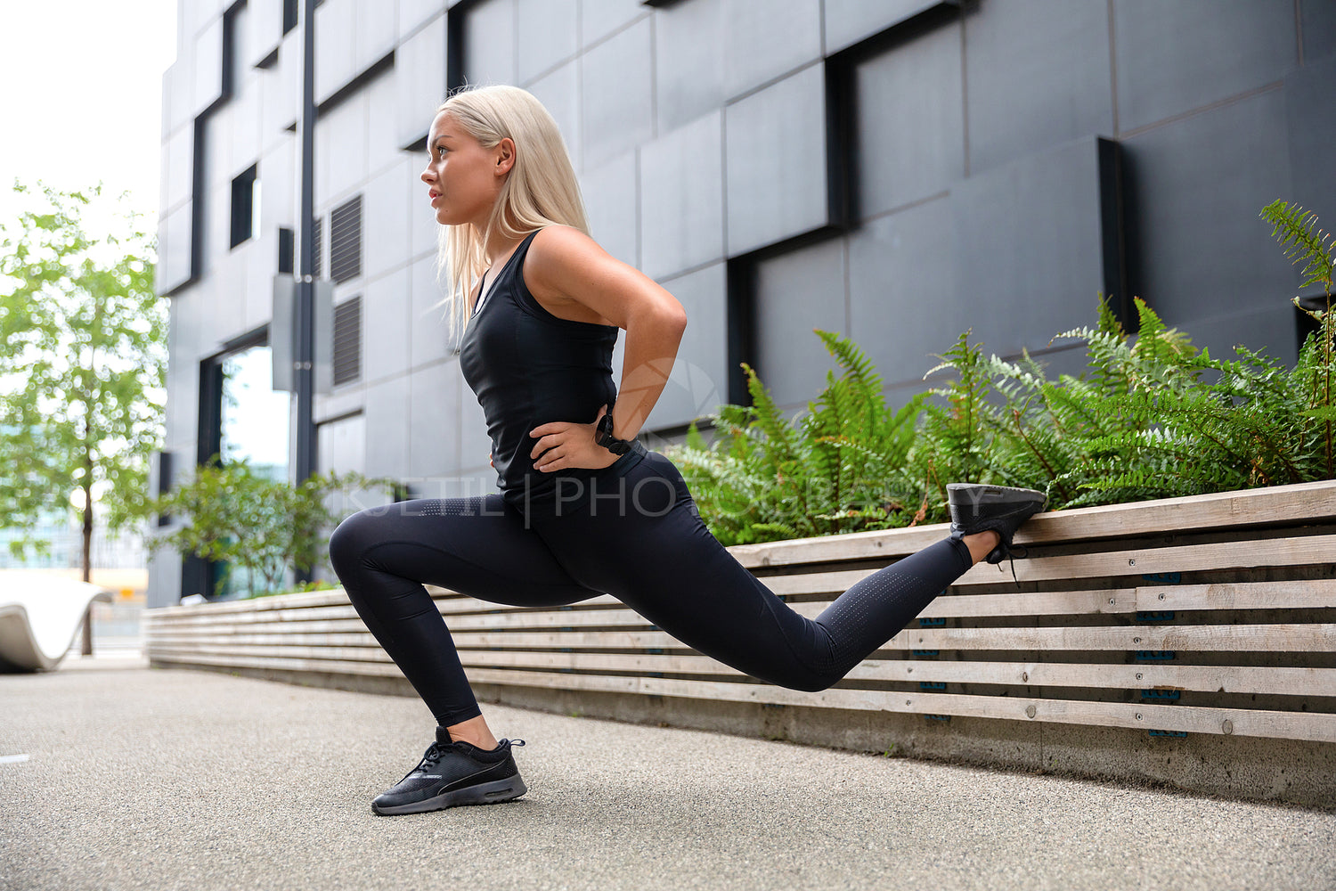 Woman Performing Lunges Workout for Thighs and Glute Outdoor in the City