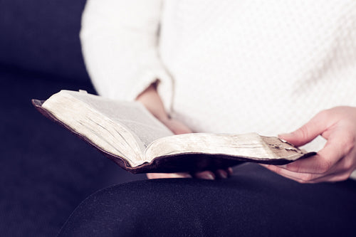 Woman reading the bible