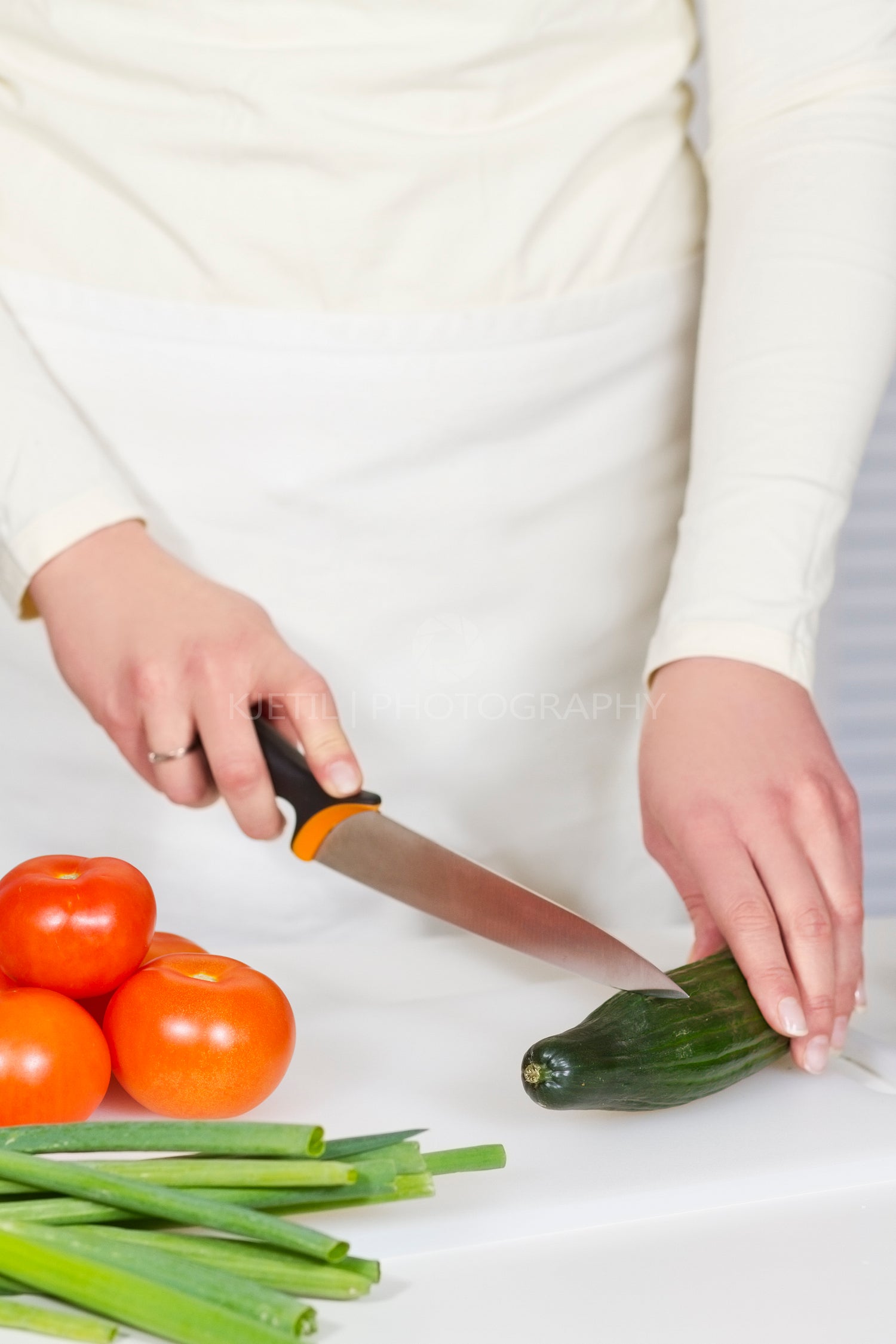 Young Woman Chop Vegetables