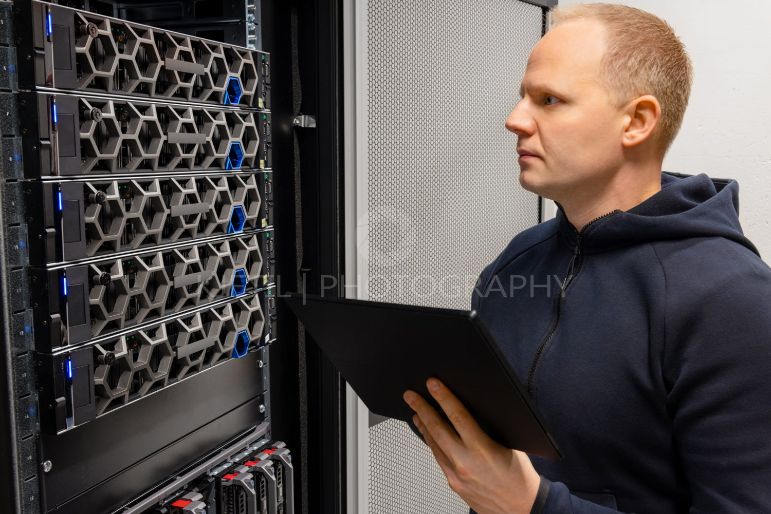 Technical Consultant With Digital Tablet Monitor Hyperconverged Servers Environment in Datacenter