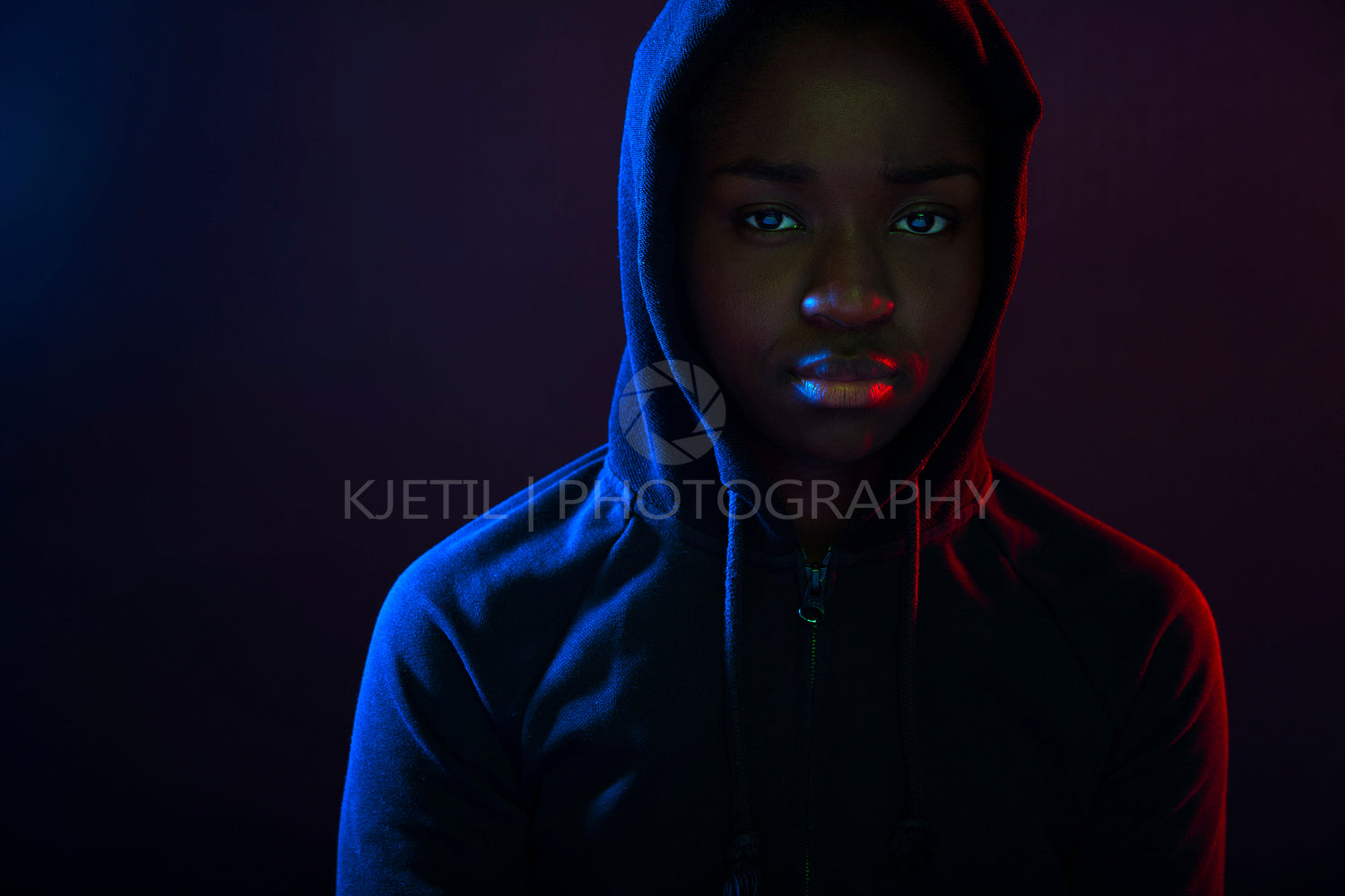 Colorful portrait of a cool woman with dark skin wearing hoodie