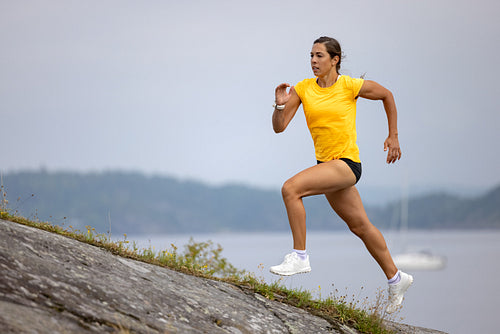 Athlete Sprinting On Mountain During Outdoor Workout