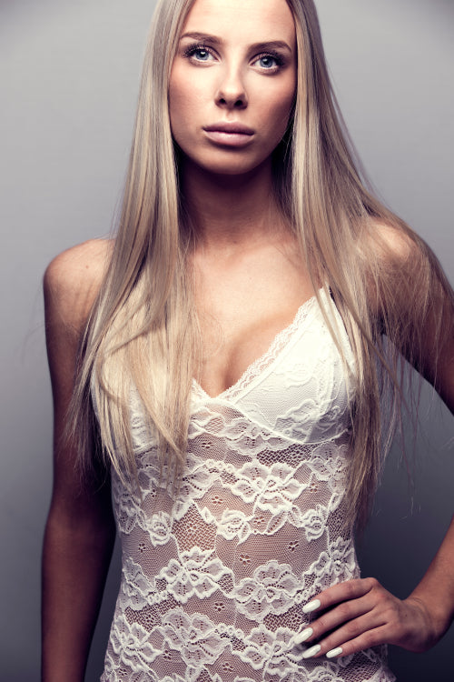 Portrait of a blonde woman model in bodysuit