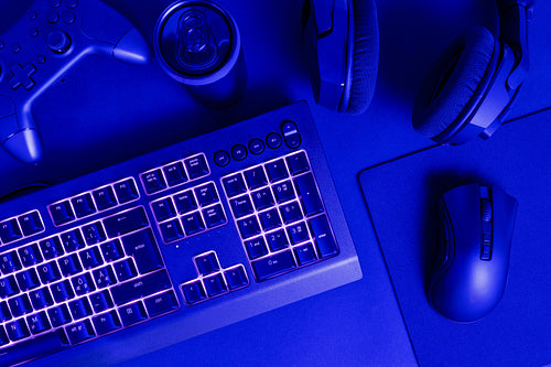 White lit keyboard by various wireless gadgets