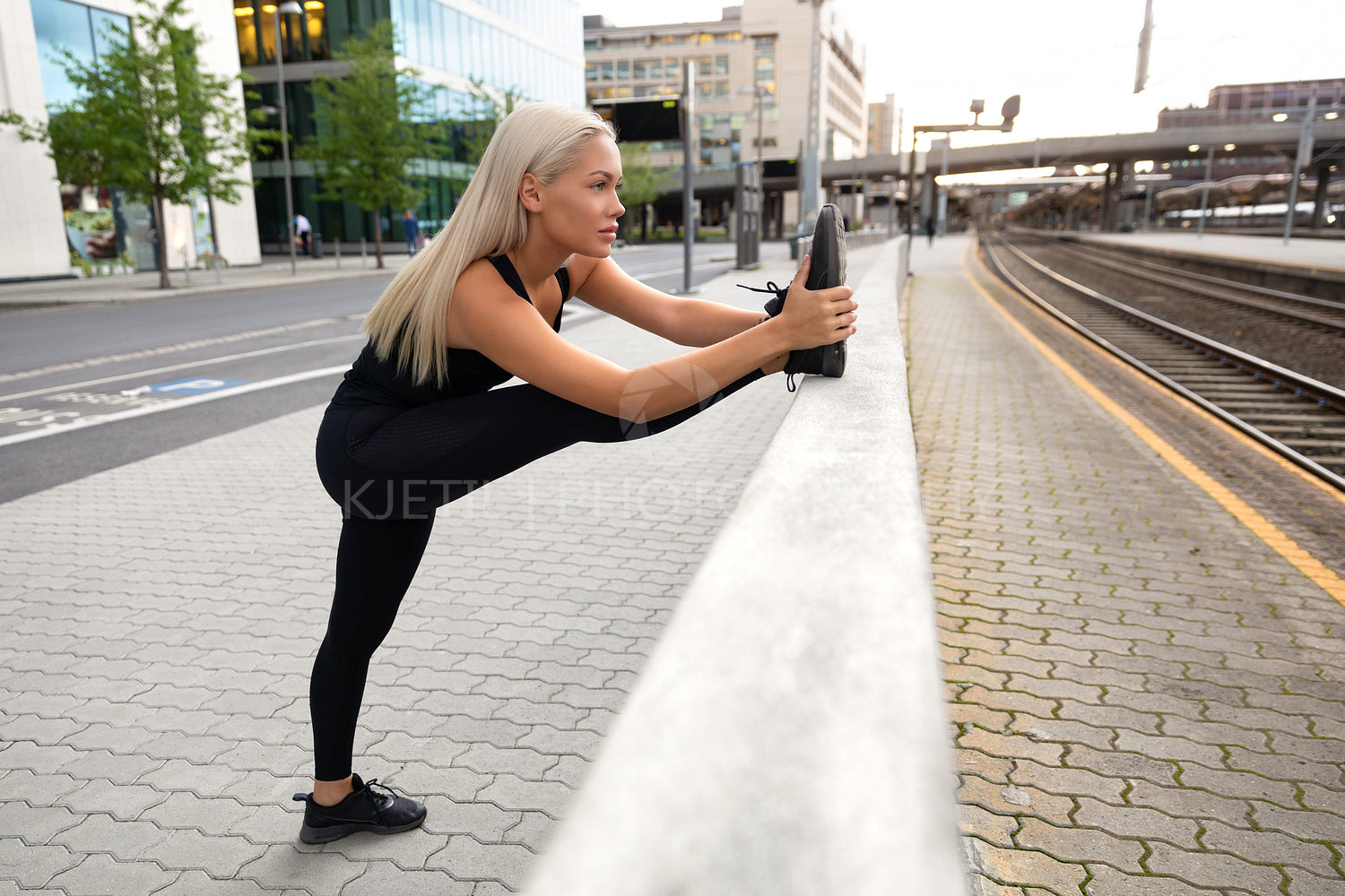 Perfect looking Urban Female Stretching Her Leg Before Exercise