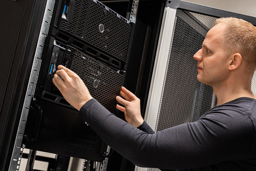 IT Professional Working With Servers In Large Datacenter