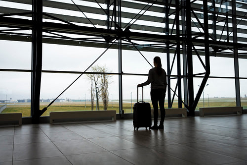 Traveler waiting at airport terminal