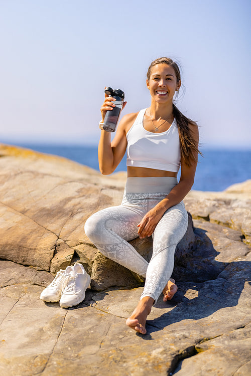 Fit Woman Taking Break During Outdoor Workout