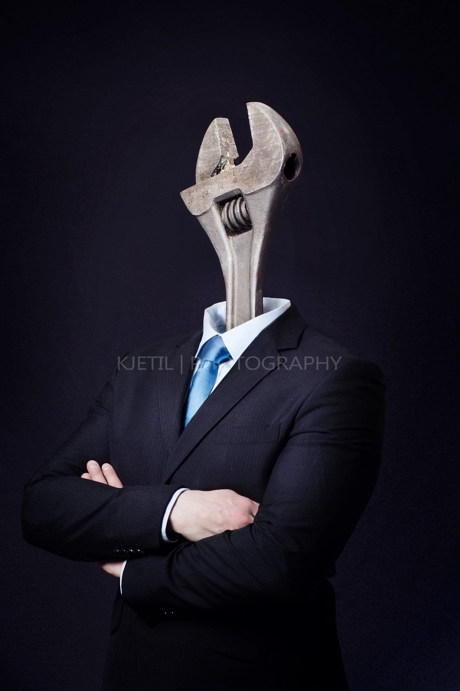 Man with Wrench Head