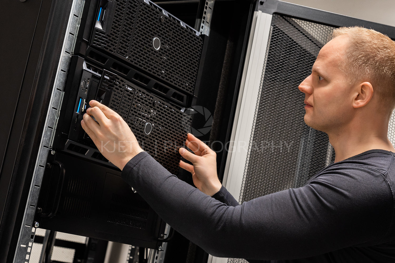 IT Professional Working With Servers In Large Datacenter