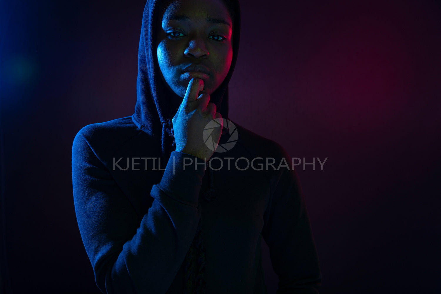 Colorful portrait of a confident african woman with dark skin wearing hoodie