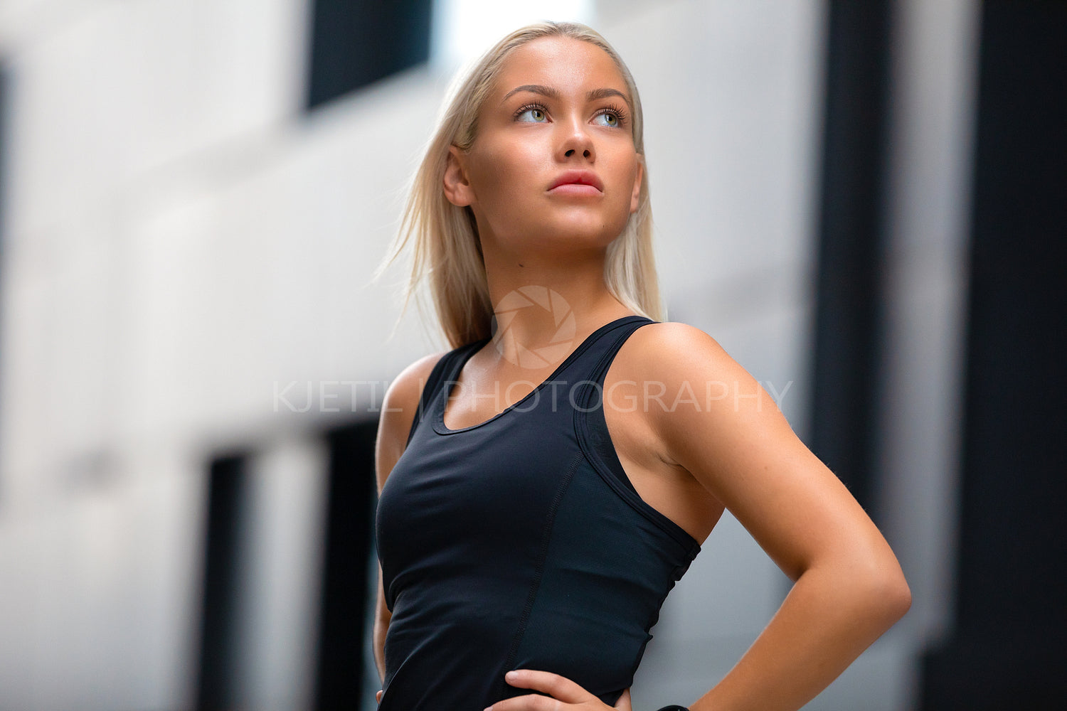 Portrati of confident Fitness Woman in Workout Outfit Standing in City