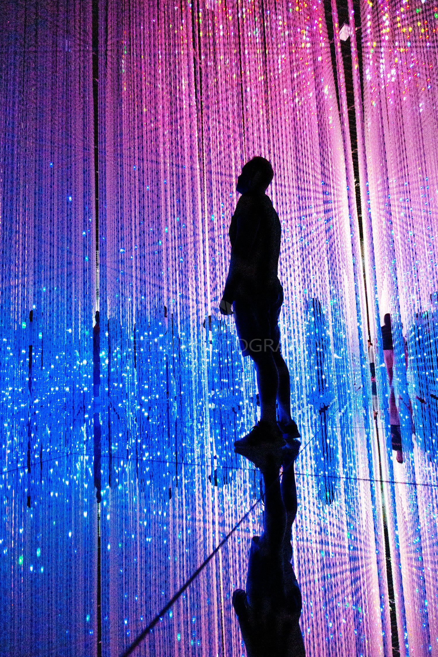 Man in illuminated abstract illuminated a futuristic world