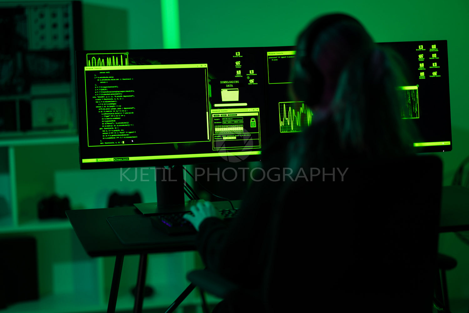 Cyber security hacker code malware to exploit vulnerability in program or system on a computer in a dark room