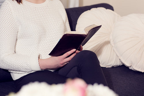 Woman reading the Bible