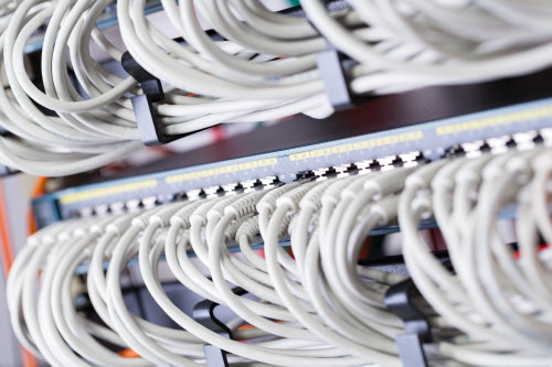 Gigabit network switch and perfect aligned patch cables in datacenter