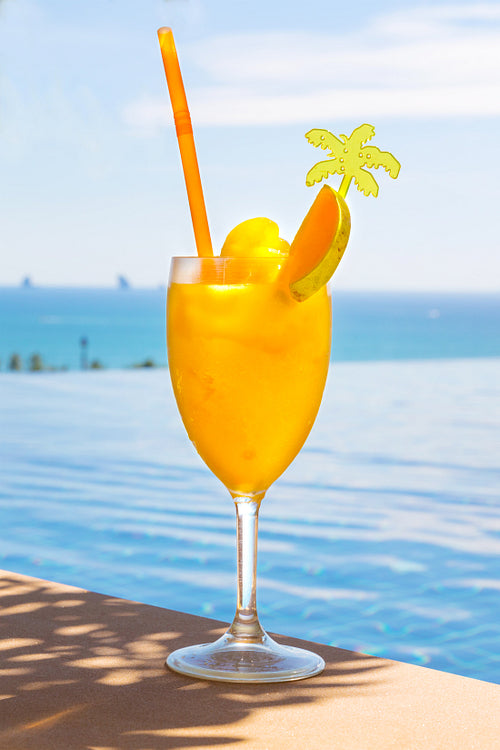 Fresh Mango Juice In Glass At Poolside