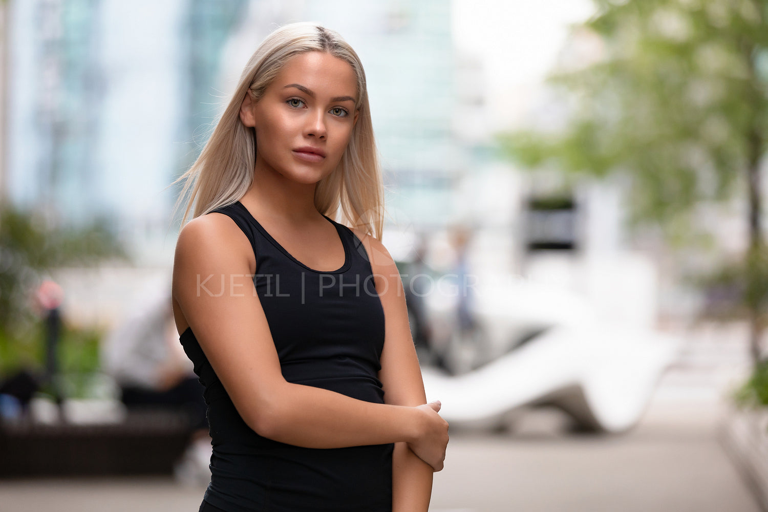 Portrait of a beautiful young woman fitness model looking at camera