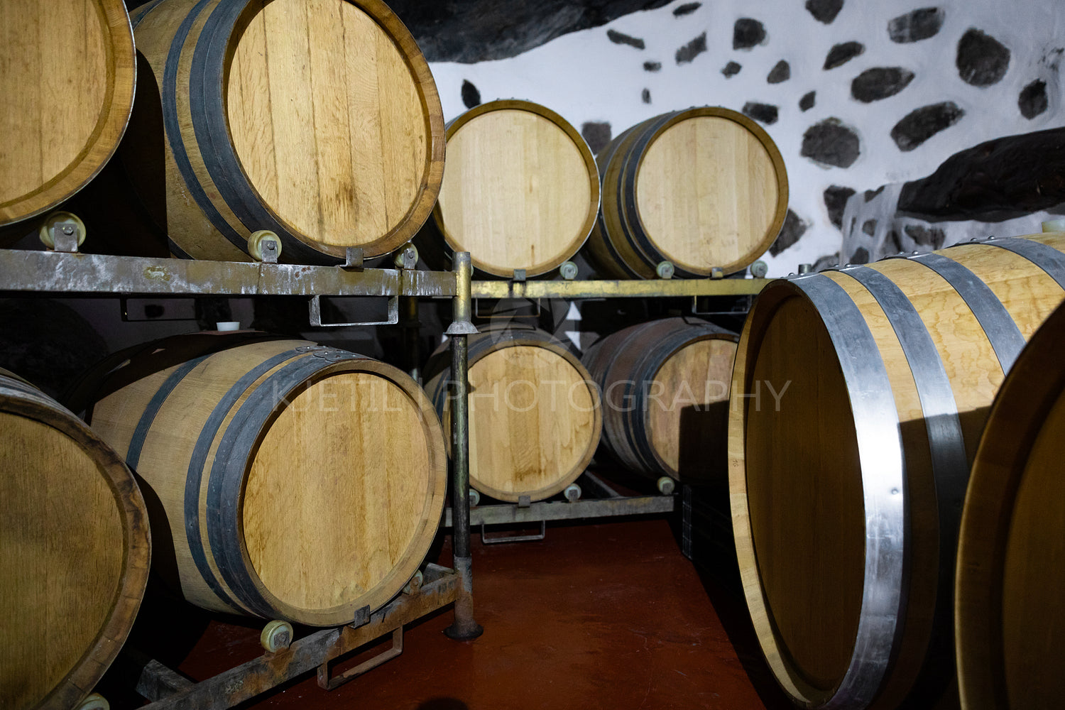 Wooden Barrels in Oak Stored At Wine Cellar Below Ground