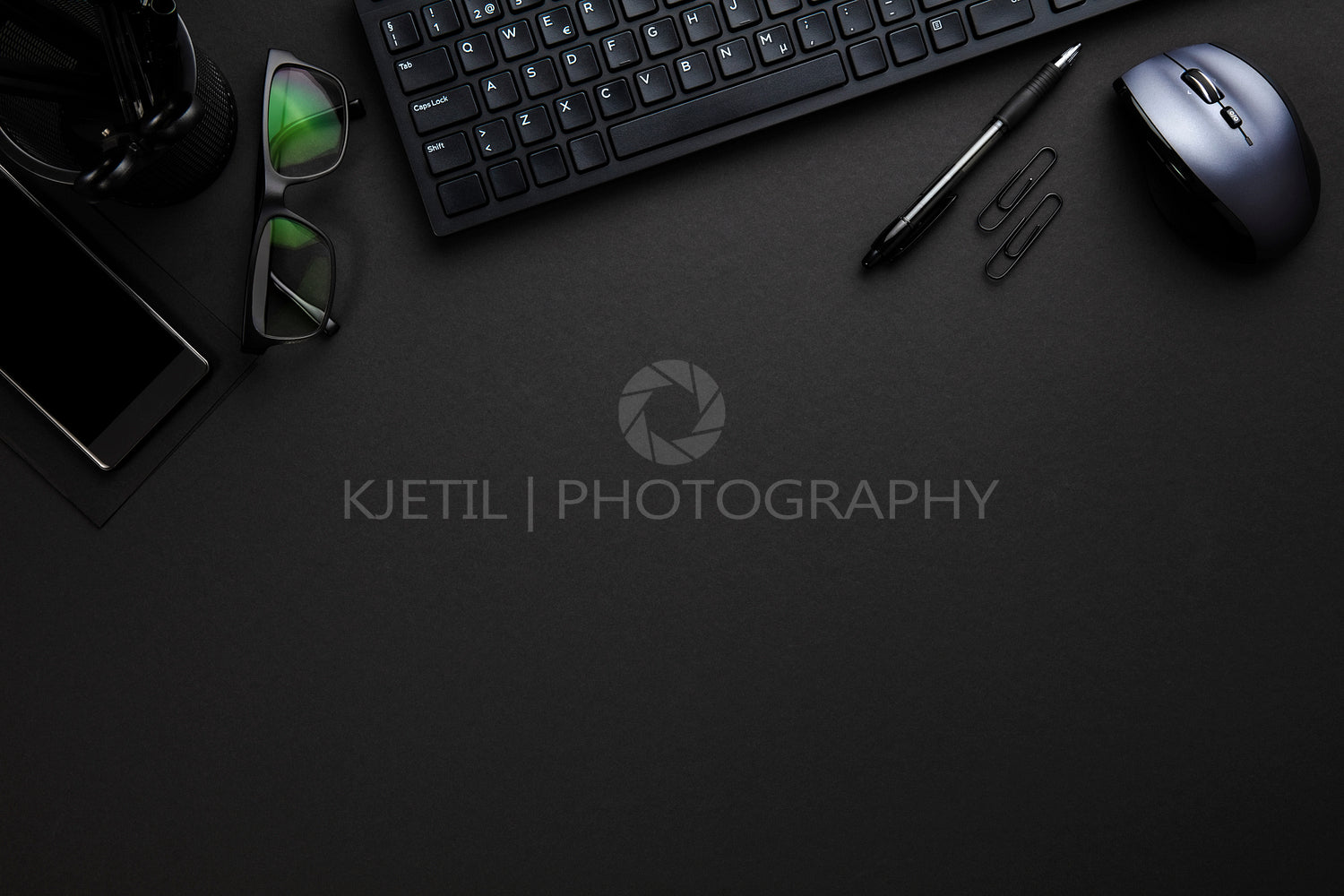 Office Supplies With Computer Keyboard And Mouse On Gray Desk