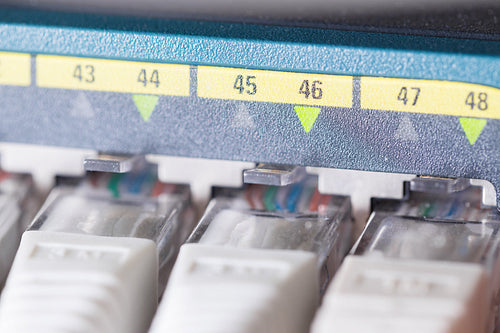 Close-up of high speed network switch and cables in datacenter
