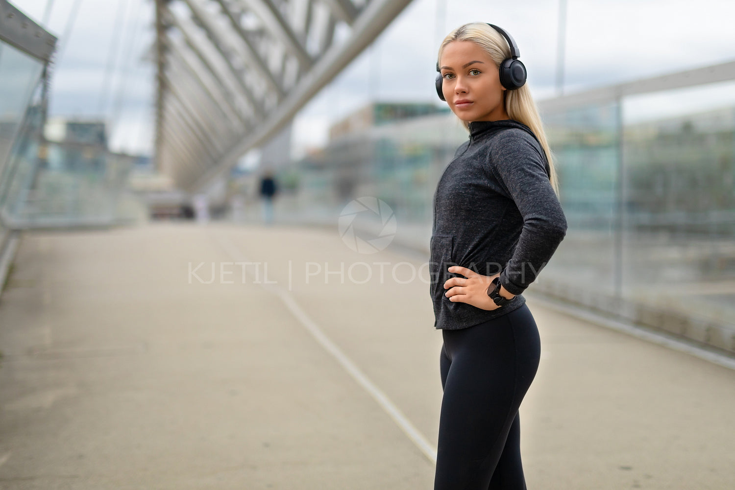 Smiling Woman in Black Workout Outfit Listen To Music on Headphones