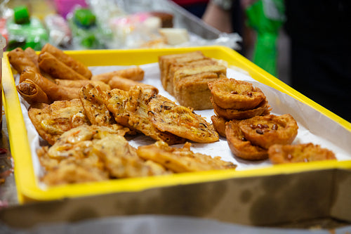 Unhealthy street food in tray at concession stand
