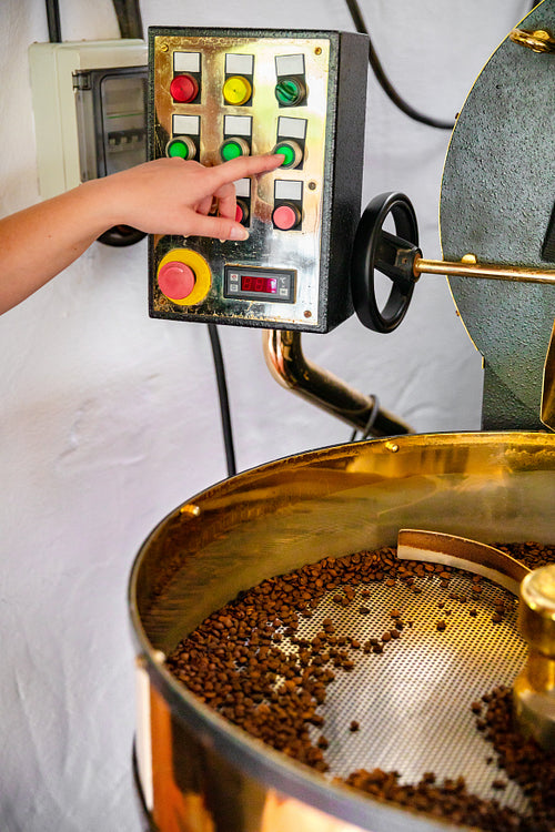 Female Handles Roaster in Organic Coffee production