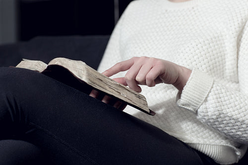 Woman reading the bible