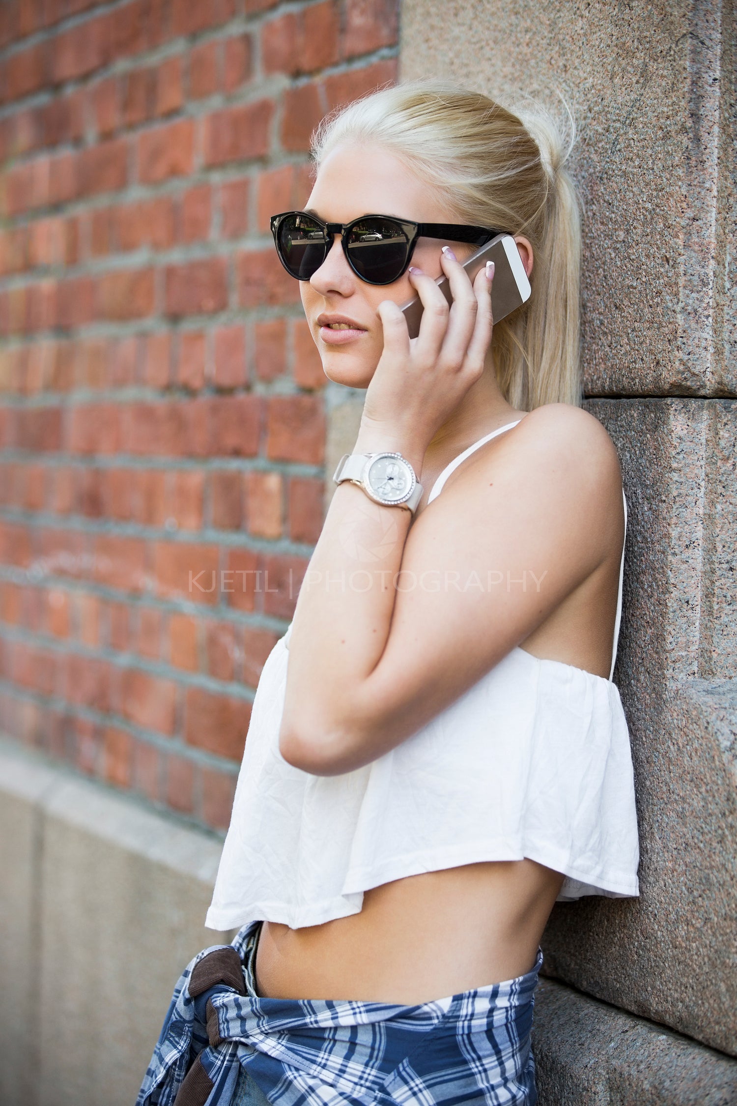 Urban and cute girl talking on the phone