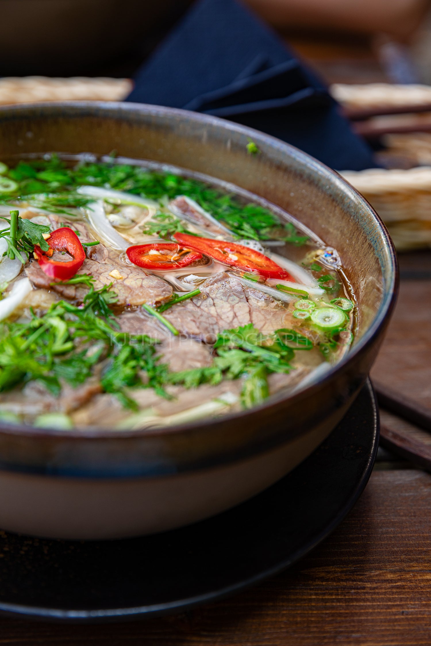 Fresh Pho soup served on table at restaurant