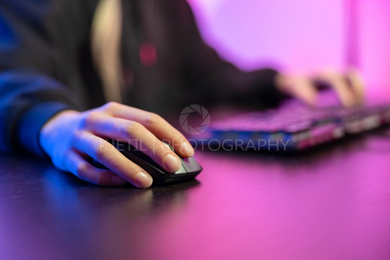 Close up of pro cyber sport gamer play game with keyboard and mouse