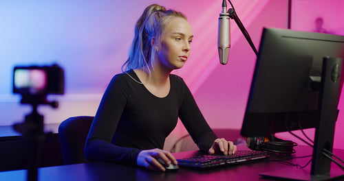 Professional E-sport Gamer Girl Streaming Online Video Game on PC